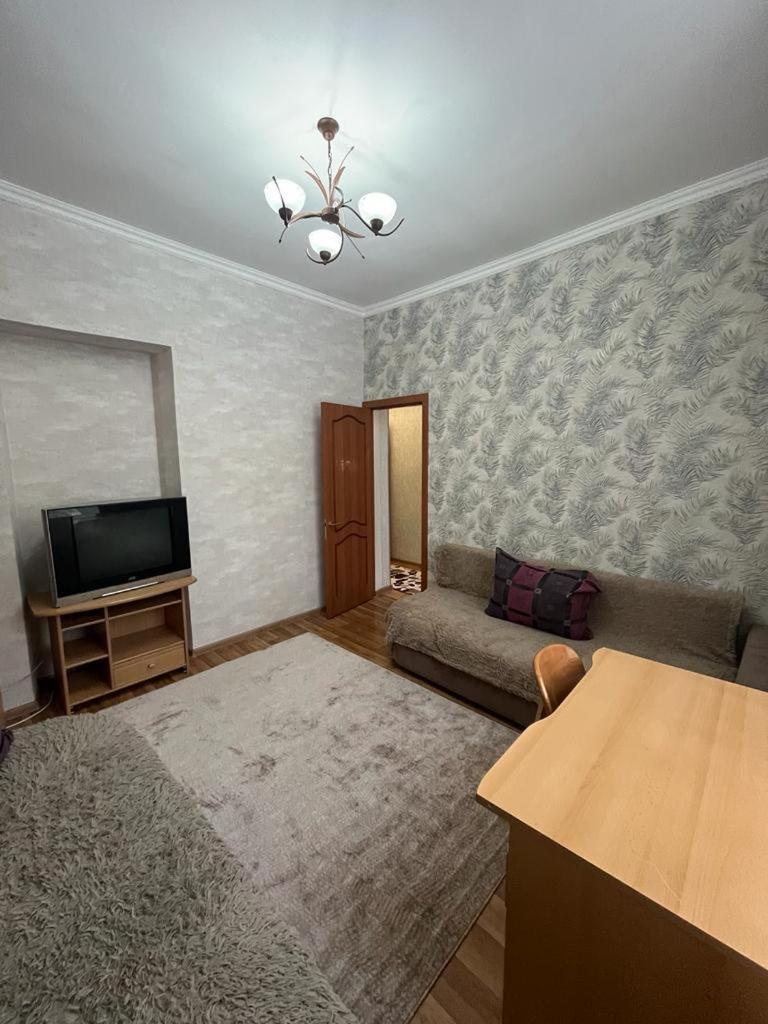 Apartments On Mustafa Ozturk Almaty Exterior photo