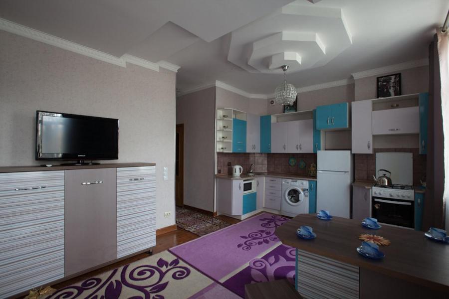 Apartments On Mustafa Ozturk Almaty Exterior photo